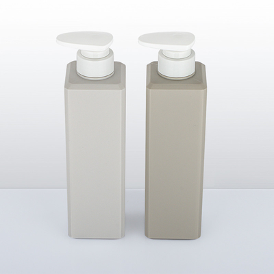 Bottiglia cosmetica della lozione dell'ANIMALE DOMESTICO quadrato con la timbratura calda del cappuccio della pompa di stampa
