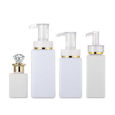 Il bianco di lusso di alta qualità personalizza la bottiglia quadrata della lozione di capelli dello sciampo con Diamond Gold Rim Cap