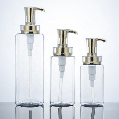 Chiara bottiglia dello sciampo della plastica della lozione di 300ml 400ml 500ml dell'hotel degli uomini vuoti di lusso del balsamo Packaging16oz con la pompa dell'oro